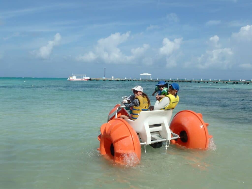 A great family activity in Grand Cayman is at Rum Point where you can rent water toys such as this super fun aqua trike.