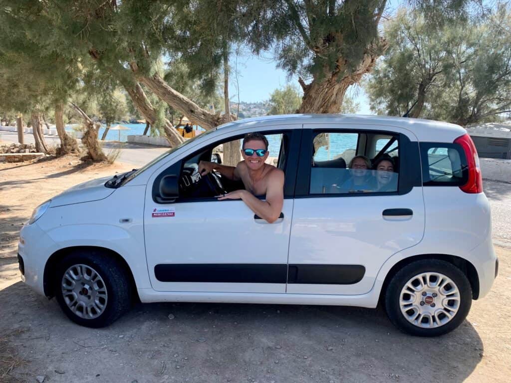 We rent a car to drive to Syros beaches.