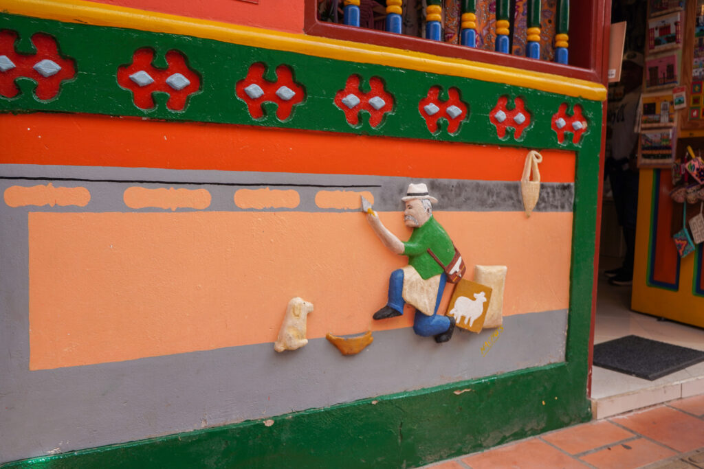 Bright colored panels on the bottoms of the buildings in Guatape Colombia are called Zocalos.
