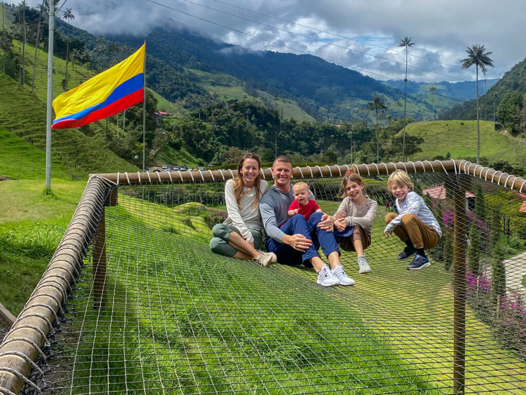Passport Explorers family in a rope canopy overlooking the beautiful mountains you will see on your Colombia three week itinerary.