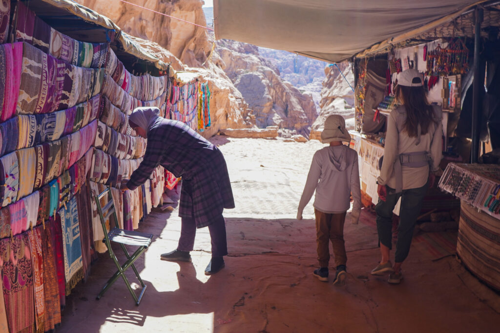 Walking past the Bedouin Tents and Vendors on the Ad Deir Trail in Petra.