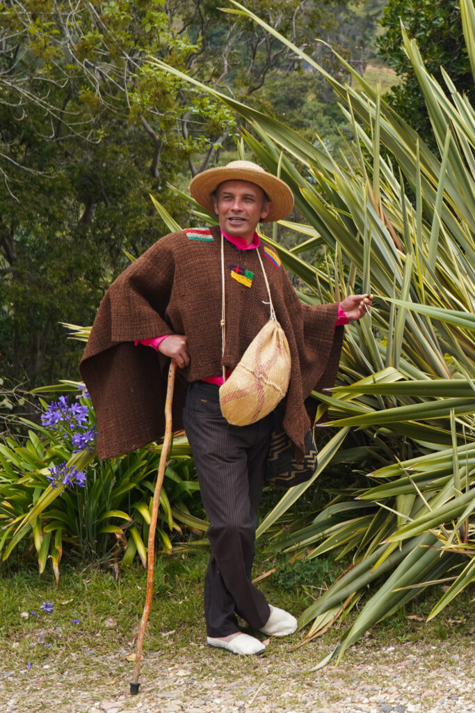 Our local guide in Colombia, dressed in traditional clothing, which you'll find also make great souvenirs. 
