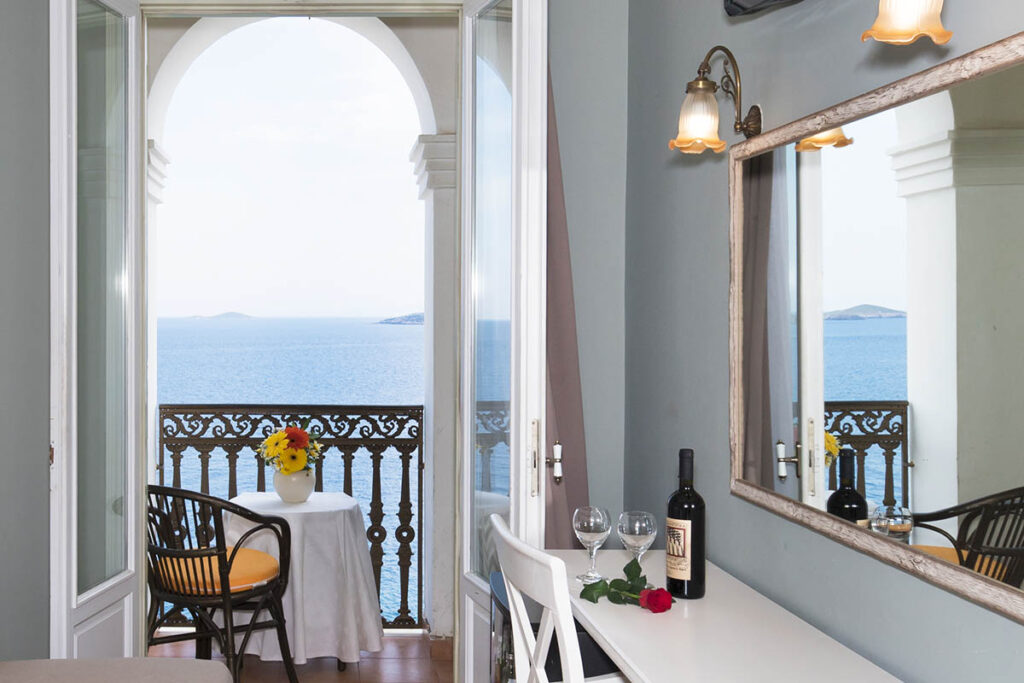 Syrou Melathron, a beautiful Syros Hotel offers deluxe sea view rooms. 