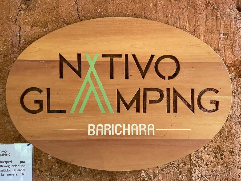 Nativo Glamping sign. Glamping in Colombia is a fun memorable way to spend a few nights of your trip and we highly recommend this family owned glamping called Nativo in Barichara Colombia. 