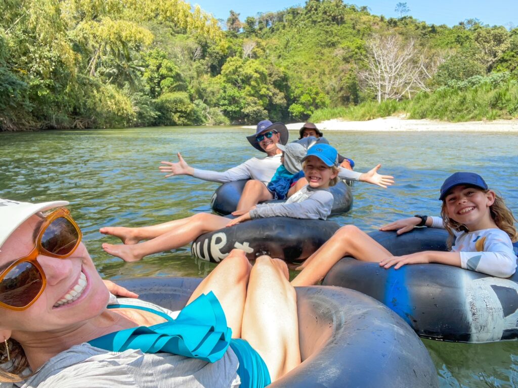 Our family tubing down the Don Diego River in Colombia, a hidden gem in Colombia and fun family activity. We even took the baby river tubing in Colombia!