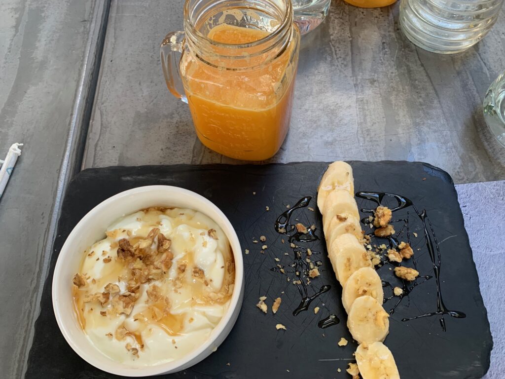 Mammos restaurant in Syros was located along the waterfront and had a delicious brunch, such as this fresh orange juice and yogurt bowl. 