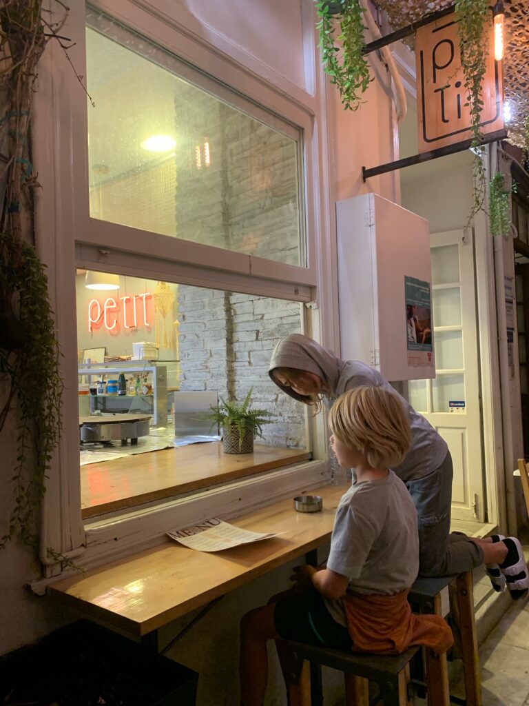 The kids ordering Crepes at a Syros cafe  in Ermoupolis. 