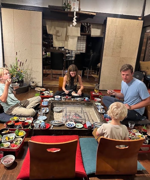our family having a traditional dinner at a wonderful stay at Kuu House in Japan